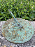 Solid Brass Grapevine Sundial in garden