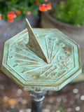 Solid Brass Rose Sundial in garden