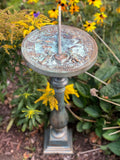 Rome's Spindle Sundial Base With Faux Aged Brass Finish in garden